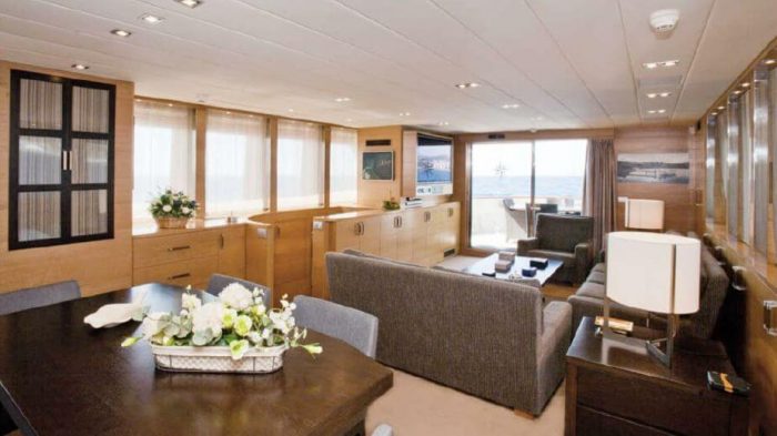 Plush main room interior of Benetti 95 Yacht